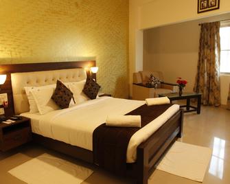 Pah The Clarista Hotel - Srīperumbūdūr - Bedroom