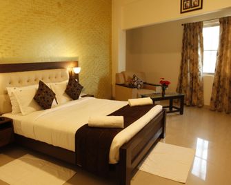 Pah The Clarista Hotel - Srīperumbūdūr - Bedroom