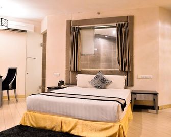 Shervinton Executive Boutique Hotel - Tawau - Ložnice