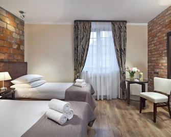 هوتل بونوم - غدانسك - غرفة نوم