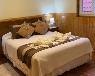 Hostal America en Puerto Natales - Puerto Natales - Schlafzimmer