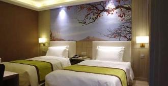 University Exchange Center Hotel - Taiyuan - Taiyuan - Yatak Odası