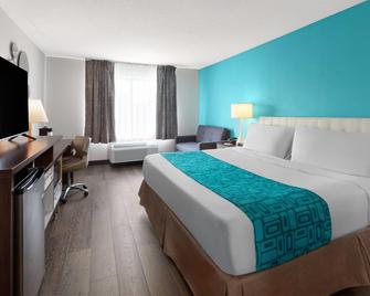 Howard Johnson by Wyndham Romulus Detroit Metro Airport - Romulus - Ložnice