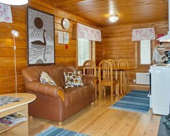 Vacation home Lepokunnas in Suomussalmi - 4 persons, 1 bedrooms - Suomussalmi - Living room
