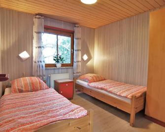 Eggert: Cozy wooden house with Scandinavian flair - Ferienhaus Eggert - Wanderup - Slaapkamer