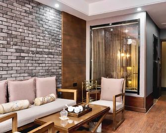 Pineapple Hotel - Linyi - Schlafzimmer