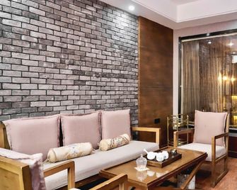 Pineapple Hotel - Linyi - Schlafzimmer