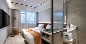 Datang Phoenix Park Business Hotel - Tangshan - Bedroom