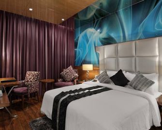 The Elanza Hotel, Bangalore - באנגאלור - חדר שינה