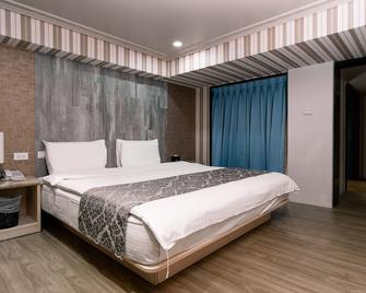 58 Hotspring Hotel - Jiaoxi Township - Bedroom