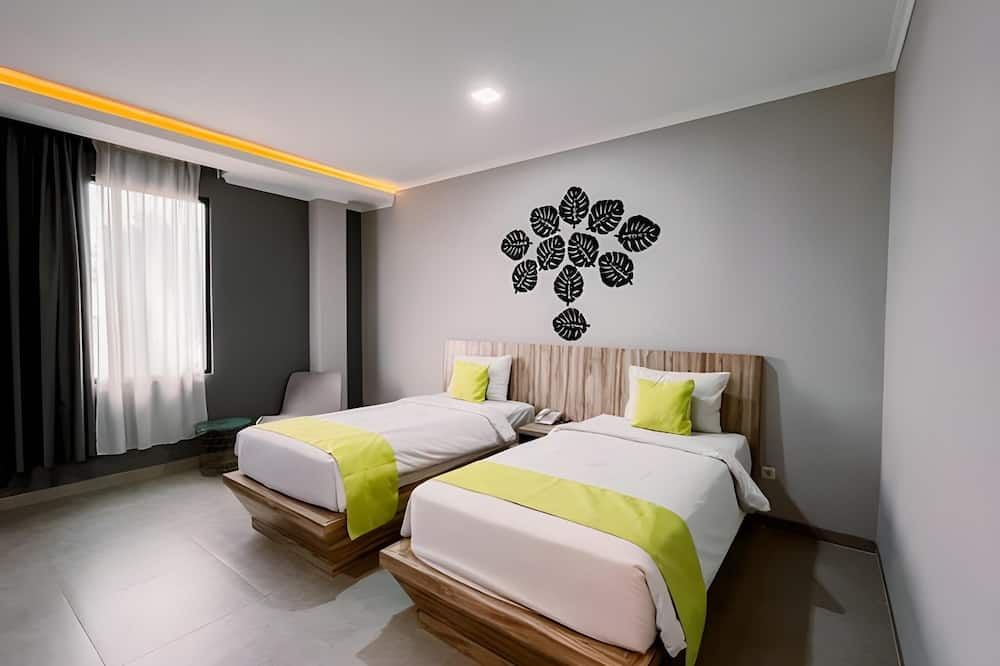 Fresh Hotel - Sukabumi - Schlafzimmer