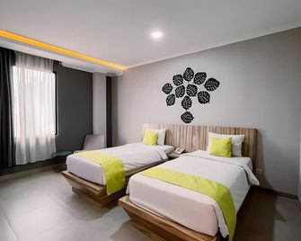Fresh Hotel - Sukabumi - Schlafzimmer
