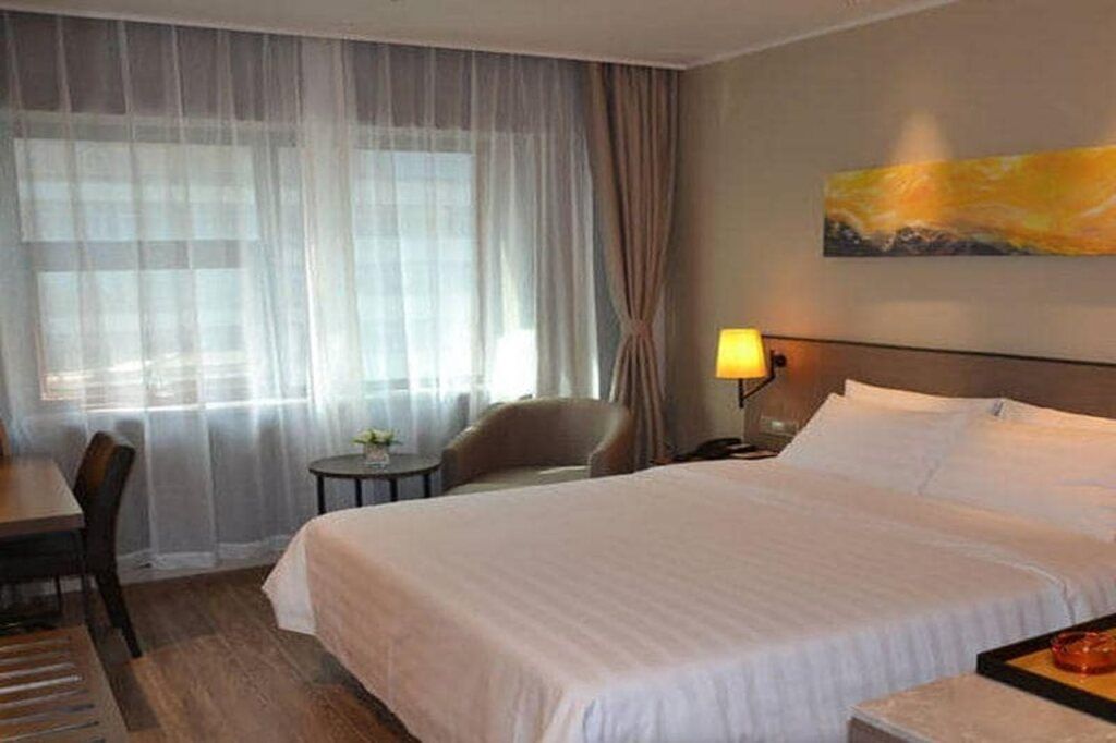 هوم إن بلس - داليان - غرفة نوم