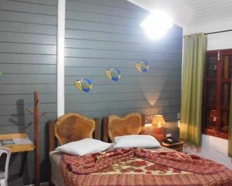 Pousada Taruma - Mucuri - Habitación