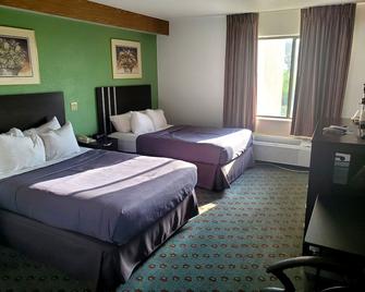 Pleasant Stay Inn and Suites - Brooklyn - Bedroom