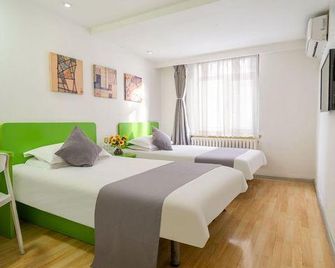 Shengbang Hotel (Dalian Malan Square Liaoshi University Branch) - Dalian - Bedroom