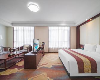 Jinghang Holiday Hotel - Jining - Bedroom