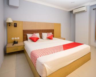 أو واي أو 1088 هوتل ميجا سينتوسا - سلاماريندا - غرفة نوم