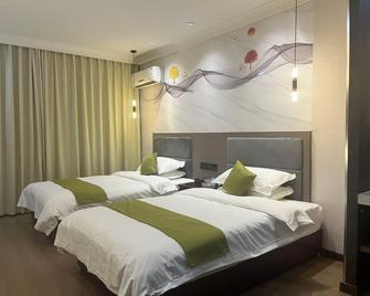 Changningyuan Hotel - Changji - Bedroom