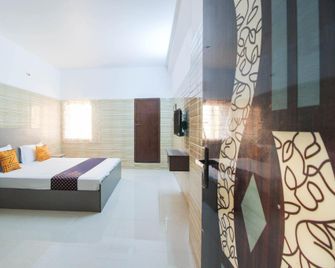 Hotel O Jp Residency - Singapperumālkovil - Bedroom
