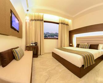 Hotel Alleviate - Agra - Bedroom