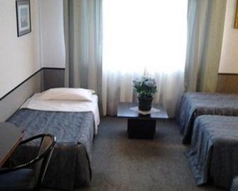 Novahotel - Reggio nell'Emilia - Slaapkamer