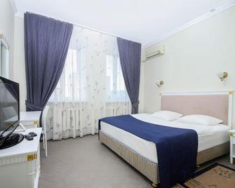 Hotel Strannik - Blagoveshchensk - Camera da letto