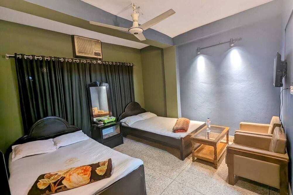 Hotel Hoque Tower International - Chittagong - Schlafzimmer