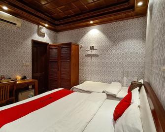 Green Hotel - Hanoi - Schlafzimmer