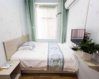 Wenfangxiaoyuan Inn - Zhangjiajie - Bedroom