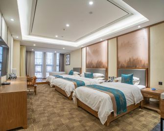 Bailu Hidden Holiday Hotel - Jiayuguan - Bedroom