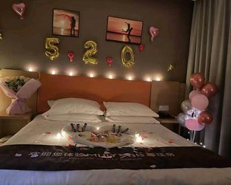 7Days Inn Zhenjiang Dashikou - Zhenjiang - Slaapkamer
