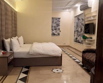 Hotel Sivana Cottage - Karachi - Bedroom