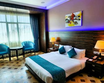 Park Regis Lotus Hotel - Manama - Habitación