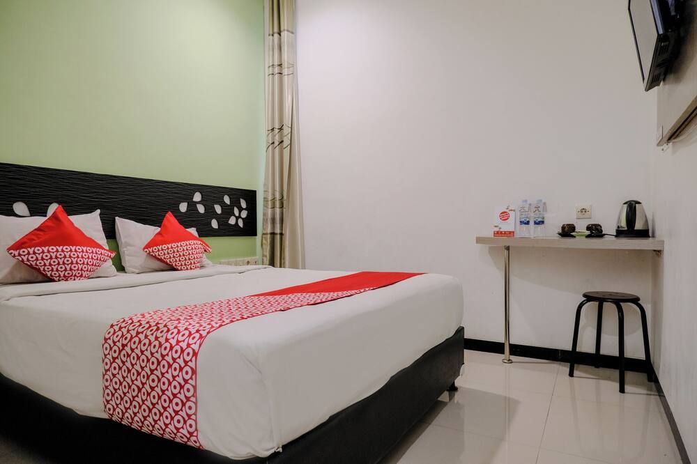 هوتل أو سيمفوني هوم ستاي تلوجوماس