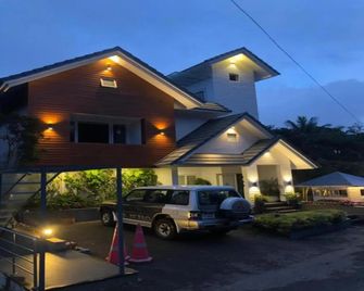 Swiss County Resort - Munnar - Bina