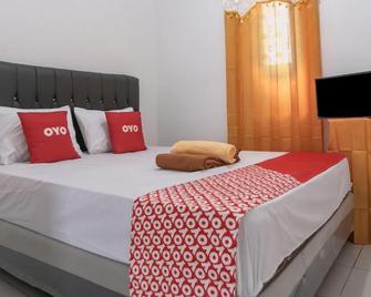 OYO 92626 Good Sleep 4 Inn Dcos Syariah - Samarinda - Schlafzimmer