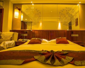 Crown Hotel Jinghong (Aegean Sea Shopping Mall & Water-Splashing Square Branch) - Xishuangbanna - Habitación