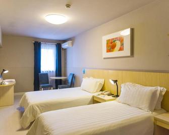 Jingjiang Inn Xi'an Zhonglou Luomashi - زيان - غرفة نوم