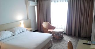 Hotel Pangeran City - Padang - Schlafzimmer