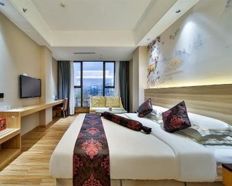 Four Seasons Premium Hotel (Bavarian World Branch) - Heyuan - Camera da letto