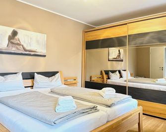 Ferienwohnung Morgensonne - modern und freundlich in zentraler Lage - Langenargen - Schlafzimmer