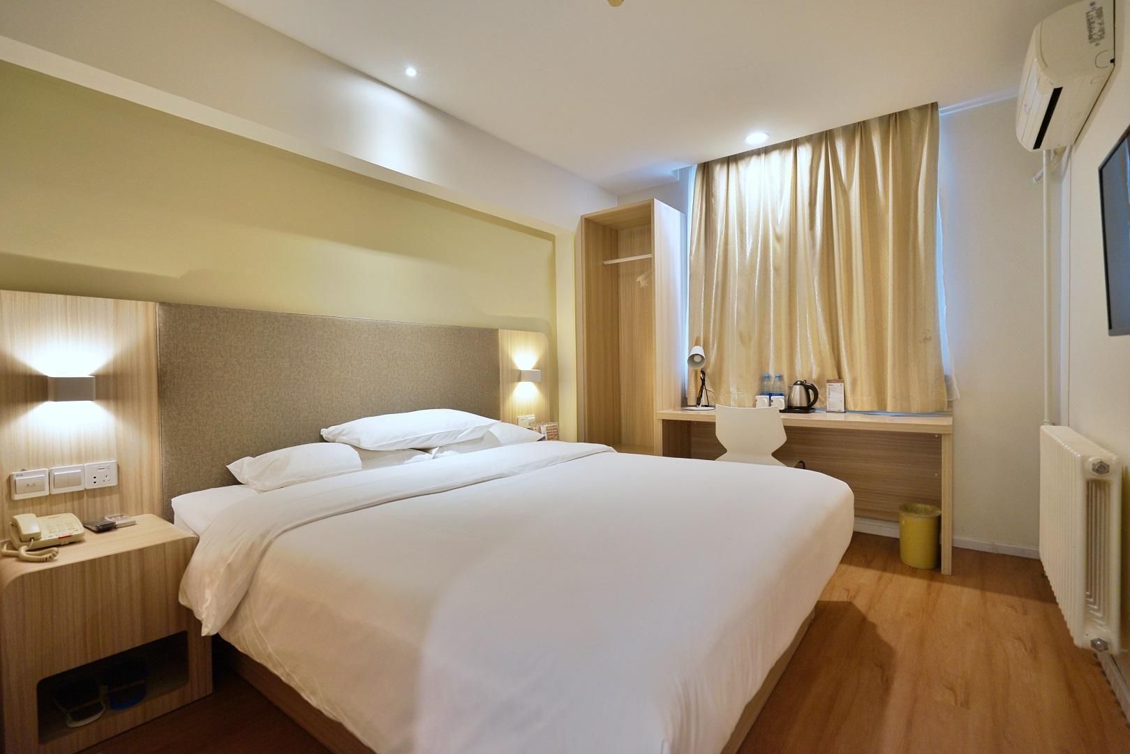 Hanting Hotel Qingdao Taidong Pedestrian Street - تشينغداو - غرفة نوم