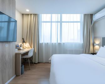 Hanting Express Xinxiang Pingyuan Road - Xinxiang - Спальня