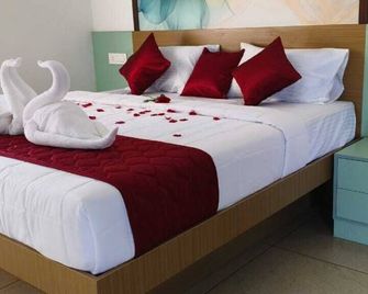 Hotel Eden Palace - Thrissur - Bedroom