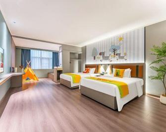 Bafang Junyue Hotel - Zhanjiang - Bedroom