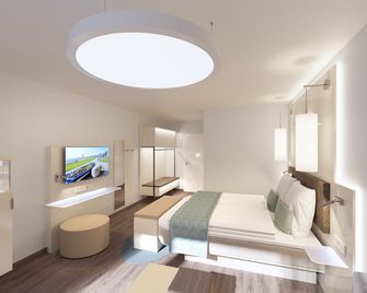 Hotel Windjammer - בוסום - חדר שינה