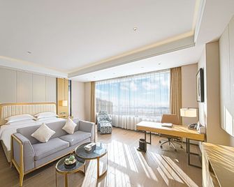 Ramada Plaza by Wyndham Shengzhou City Center - שאושינג - חדר שינה