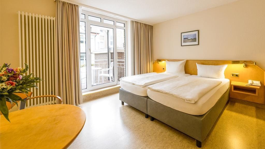 Michels Gästehaus Meerzeit - נורדרניי - חדר שינה