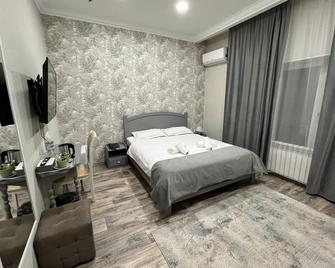 Hotel 'Continent' Halal - Karaganda - Schlafzimmer